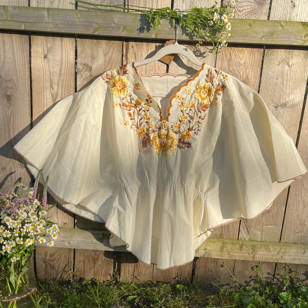 Embroidered butterfly style sleeved floral blouse